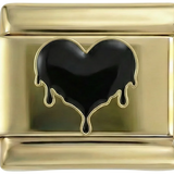 Cœur noir fondant sur fond doré
